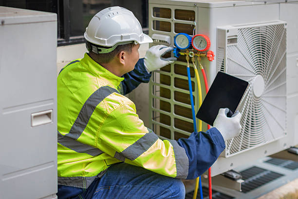 Professional Hvac technician working in Russells Point, OH